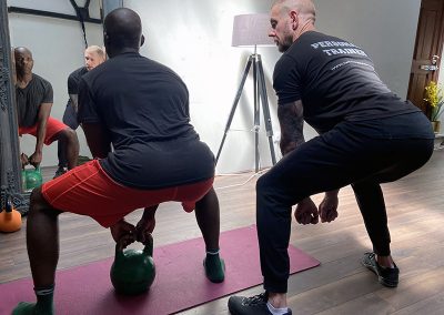 Steve explaining how to Kettlebell squat