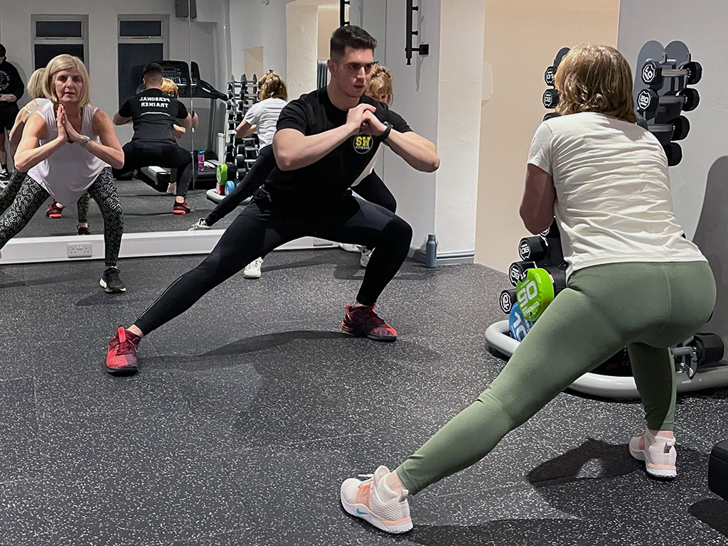 Group training session with clients at the gym studio in Tarporley, Cheshire.